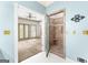 A view into the bathroom featuring a walk-in shower at 180 Habersham Pl, Fayetteville, GA 30214