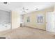 Bedroom with neutral walls, built in shelves and cabinetry, and large windows at 180 Habersham Pl, Fayetteville, GA 30214