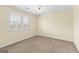 Cozy bedroom featuring carpet flooring, a ceiling fan, and plantation shutters at 180 Habersham Pl, Fayetteville, GA 30214