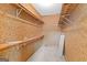 Walk-in closet with custom shelves at 180 Habersham Pl, Fayetteville, GA 30214
