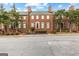 Charming brick townhomes with well-maintained front yards and street view at 180 Habersham Pl, Fayetteville, GA 30214