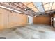 Unfinished garage featuring a concrete floor and exposed ceiling at 180 Habersham Pl, Fayetteville, GA 30214