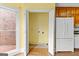 A view into the laundry room area, complete with hookups and storage at 180 Habersham Pl, Fayetteville, GA 30214