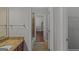 Bathroom boasts granite counters, tile floors, and combined tub/shower with tile surround at 560 Birkdale Dr, Fayetteville, GA 30215
