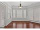 Sun-filled breakfast nook featuring large windows and french door at 560 Birkdale Dr, Fayetteville, GA 30215