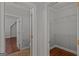 This image shows the closet with shelving providing ample storage space at 560 Birkdale Dr, Fayetteville, GA 30215