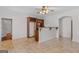Kitchenette area with tiled floors, custom cabinets and serving bar at 560 Birkdale Dr, Fayetteville, GA 30215
