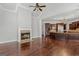 Open concept living room with fireplace open to kitchen at 560 Birkdale Dr, Fayetteville, GA 30215