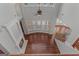 Bright living room with fireplace, hardwood floors, and lots of natural light coming in through many windows at 560 Birkdale Dr, Fayetteville, GA 30215