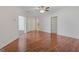 Open concept living area with wood floors, neutral walls and great lighting is perfect for entertaining guests at 560 Birkdale Dr, Fayetteville, GA 30215