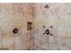 Close-up of the shower with bronze fixtures and a tiled inset shelf at 560 Birkdale Dr, Fayetteville, GA 30215