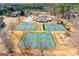 Aerial view of community tennis courts and playground offering recreational opportunities at 560 Birkdale Dr, Fayetteville, GA 30215