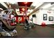 Well-equipped gym with modern exercise machines and a dedicated yoga area at 545 Discovery Lake Dr # 409, Fayetteville, GA 30215