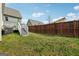 Spacious backyard with a wooden fence, offering privacy and a great space for outdoor activities and gatherings at 906 Sims Sw St, Atlanta, GA 30310