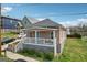 Bungalow-style home with a charming front porch, showcasing a well-maintained exterior and inviting curb appeal at 906 Sims Sw St, Atlanta, GA 30310