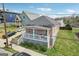 Bungalow-style home with a charming front porch, showcasing a well-maintained exterior and inviting curb appeal at 906 Sims Sw St, Atlanta, GA 30310