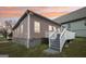 Cozy home featuring a well-maintained outdoor deck and stairs at 906 Sims Sw St, Atlanta, GA 30310