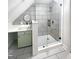 Modern bathroom with a glass-enclosed shower and vanity with sink at 1832 Glenwood Ln, Snellville, GA 30078