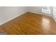Cozy bedroom with hardwood floors and neutral walls at 1832 Glenwood Ln, Snellville, GA 30078