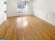 Charming dining room with wainscoting, hardwood floors, and lots of natural light at 1832 Glenwood Ln, Snellville, GA 30078
