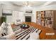 Inviting living room with fireplace, stylish decor, and plenty of natural light at 1832 Glenwood Ln, Snellville, GA 30078