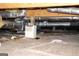 Clean crawlspace with insulation, ductwork, and a dehumidifier for moisture control at 5188 Ashley Se Dr, Covington, GA 30014