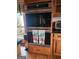 Stainless steel double oven and matching microwave, seamlessly built into the custom kitchen cabinetry at 5188 Ashley Se Dr, Covington, GA 30014