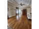 Spacious bedroom featuring a tray ceiling, hardwood floors, and neutral paint at 5188 Ashley Se Dr, Covington, GA 30014