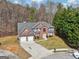 Stunning two-story brick home with two-car garage on a manicured lot with mature trees at 204 Eleanor Ct, Stockbridge, GA 30281
