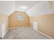 Finished attic space with neutral walls and carpet at 204 Eleanor Ct, Stockbridge, GA 30281