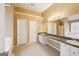 Spacious bathroom with double sink vanity, ample counter space and neutral finishes at 204 Eleanor Ct, Stockbridge, GA 30281