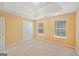 Spacious bedroom with tray ceiling and natural light at 204 Eleanor Ct, Stockbridge, GA 30281