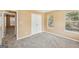 Neutral bedroom with carpet, closet and bright windows at 204 Eleanor Ct, Stockbridge, GA 30281