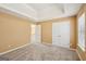 Open bedroom with double closet and neutral colors at 204 Eleanor Ct, Stockbridge, GA 30281
