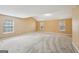 Vast bonus room with three large bright windows at 204 Eleanor Ct, Stockbridge, GA 30281