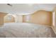 Unfurnished bonus room with neutral walls and carpet at 204 Eleanor Ct, Stockbridge, GA 30281