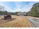 Scenic view of the Brentwood Park clubhouse and grounds on a sunny day at 204 Eleanor Ct, Stockbridge, GA 30281