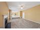 Open concept living room leads to the kitchen and features a cozy fireplace at 204 Eleanor Ct, Stockbridge, GA 30281