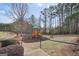 Colorful playground with slides, swings, and climbing features at 204 Eleanor Ct, Stockbridge, GA 30281