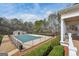Community pool featuring a large pool deck and covered in the off season at 204 Eleanor Ct, Stockbridge, GA 30281