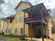 Back of house with a deck, siding, windows, and an exterior door at 4371 Minkslide Sw Dr, South Fulton, GA 30331
