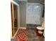 An accessible bathroom with a shower and safety features at 4371 Minkslide Sw Dr, South Fulton, GA 30331