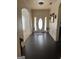 Inviting foyer featuring dark hardwood floors and an arched doorway adding architectural interest at 4371 Minkslide Sw Dr, South Fulton, GA 30331