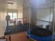 Open loft space with a trampoline and carpeted floors at 4371 Minkslide Sw Dr, South Fulton, GA 30331