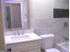 Updated bathroom features a tub/shower combo, marble vanity, and chrome finishes at 5017 Galbraith Cir, Stone Mountain, GA 30088