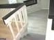Close up view of staircase with modern finishes at 5017 Galbraith Cir, Stone Mountain, GA 30088