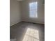 Bedroom with window, gray walls and carpet at 5626 Pine Gate Pine Gate Dr, Atlanta, GA 30349