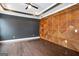 Bedroom featuring hardwood floors, accent wall, stylish ceiling fan, and recessed lighting at 1045 Kirkland Cir, Smyrna, GA 30080