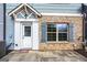 Inviting front entrance with white door, brick accents, and a welcoming welcome mat at 1045 Kirkland Cir, Smyrna, GA 30080
