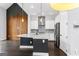 Modern kitchen with an island, stainless steel appliances, and designer backsplash at 1045 Kirkland Cir, Smyrna, GA 30080